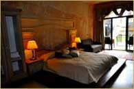 Superior Deluxe Cave Room Venus Honeymoon Room bed is Cappadocia Cave Hotel 